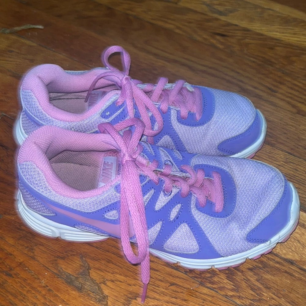 Purple Nikes slightly worn Size 5.5 US